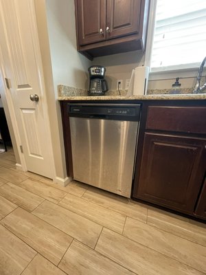 Dishwasher installation - the dishwasher was connected securely, leveled and attached to the cabinets Dishwasher installation - the dishwasher was connected securely, leveled and attached to the cabinets