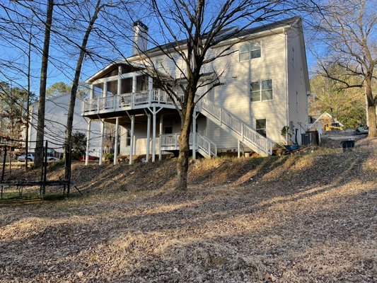 Stone block retaining walls - Unprofected cliff right under raised sunroom is now stable for a 100 years! :)