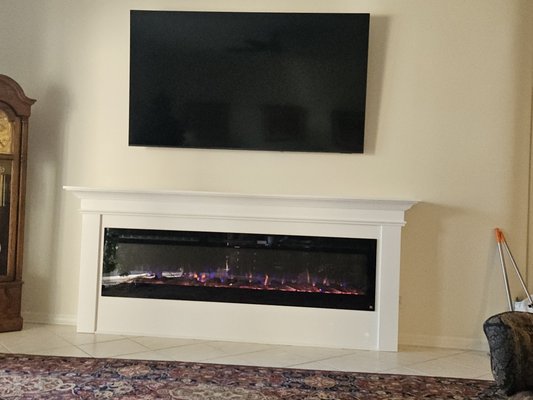 tv and fireplace custom built - fire place and tv install hidden wires