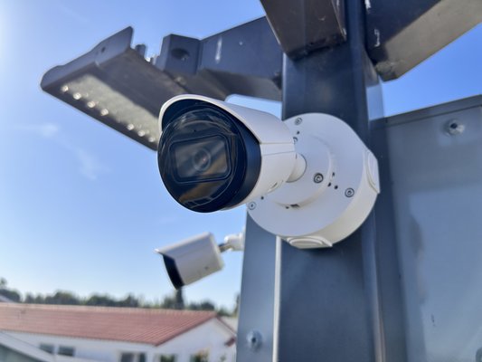 Camera Install at Laguna Hills Estates - We recently completed a custom security camera setup for Laguna Hills Estates, where the team was asked to add 4 high-quality IP cameras across two separate remote areas of the property.
To make it happen without running long cables or trenching, we set up a **wireless connection using Ubiquiti NanoBeams**—basically, a powerful point-to-multi-point WiFi bridge that lets cameras in distant spots “talk” to the main system like they’re right next door.
Now, both remote stations have a **strong, stable connection** to the main network, and the new cameras are fully integrated for easy monitoring and recording. No messy wiring, no signal drops—just a clean and professional install designed to keep things secure and simple.
Looking for a similar setup? We’ve got you covered! Camera Install at Laguna Hills Estates - We recently completed a custom security camera setup for Laguna Hills Estates, where the team was asked to add 4 high-quality IP cameras across two separate remote areas of the property.
To make it happen without running long cables or trenching, we set up a **wireless connection using Ubiquiti NanoBeams**—basically, a powerful point-to-multi-point WiFi bridge that lets cameras in distant spots “talk” to the main system like they’re right next door.
Now, both remote stations have a **strong, stable connection** to the main network, and the new cameras are fully integrated for easy monitoring and recording. No messy wiring, no signal drops—just a clean and professional install designed to keep things secure and simple.
Looking for a similar setup? We’ve got you covered!