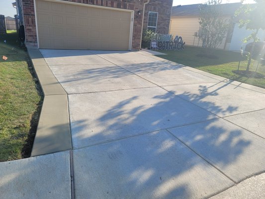 Driveway extension and back patio - Costumer needed more space on driveway and back yard Driveway extension and back patio - Costumer needed more space on driveway and back yard