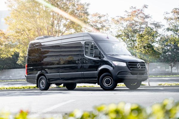 Sprinter Van - Experience the ultimate in comfort and space with our 15-passenger Sprinter vans at MVNN Motors! Perfect for group outings, family trips, or corporate events, our Sprinter vans offer generous room for passengers and luggage alike. Equipped with modern amenities and designed for a smooth ride, these vans are ideal for any journey. Enjoy the freedom to travel together while ensuring an enjoyable and memorable experience for everyone. Book your Sprinter van today and hit the road with ease!