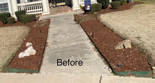 Edging replacement - Edging replacement in the front of property. Was replaced with brown Bend-a-board edging