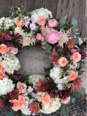 Sympathy Arrangements - Each arrangement is carefully put together to your specifications. Call today to get started with your sympathy arrangement custom made for you!