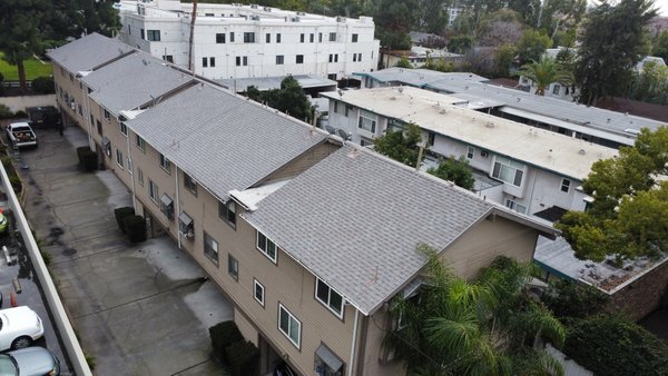 Commercial Gutter Cleaning - Gutter cleaning, leaf filter installation, driveway and walkway pressure wash for 7 townhome units in Pasadena.