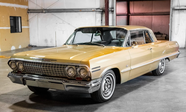 1963 Chevy Impala Super Sport - This customer wanted a general vehicle inspection. After the inspection all parties agreed that the following would be addressed:
* Correct minor electrical issues
* Repair faulty ground for turn signals
* Cleaned corrosion so horn would work
* Located and installed correct valve covers and decals
* Located and installed correct fuel cap
* Driver's side door hinge spring was broken - installed new hinge
* Locate and install correct factory wheels without chrome
* Replaced the carburetor
* Replaced spark plugs
* Replaced battery
* Installed new speedometer cable and verified it worked correctly.
* Transmission wasn't shifting out of first gear - install new tensioner and kick down as they both weren't properly assembled.