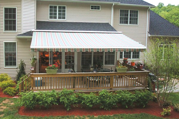 Colorado style Retractable Awning - Our Colorado made retractable awning line, is made to withstand our climate, with a 15 year warranty on the frame and many other options to choose from such as a wind sensor to automatically roll in the awning if a sudden wind should happen. All of our products are made here in Littleton Co., Since we are a manufacturer we are able to pass on the wholesale costs to our retail customers at a push of a button ! Colorado style Retractable Awning - Our Colorado made retractable awning line, is made to withstand our climate, with a 15 year warranty on the frame and many other options to choose from such as a wind sensor to automatically roll in the awning if a sudden wind should happen. All of our products are made here in Littleton Co., Since we are a manufacturer we are able to pass on the wholesale costs to our retail customers at a push of a button !