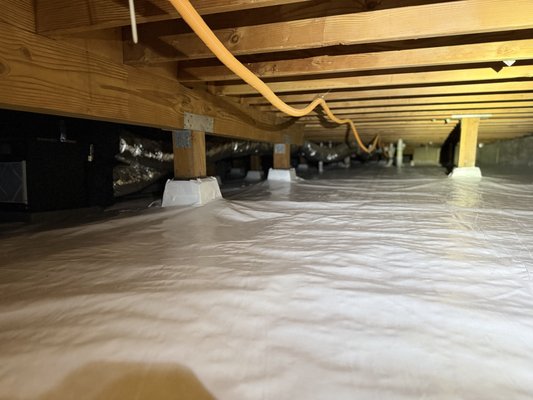 Moisture control system - Premium second-layer 12–20 mil vapor barrier installation as part of a full crawlspace moisture protection system. This heavy-duty reinforced barrier is designed to create an additional layer of defense against ground moisture, humidity, and long-term structural damage. By upgrading to a thicker premium material, the crawlspace stays cleaner, drier, and better protected year-round. Proper vapor barrier installation can also help reduce musty odors, improve indoor air quality, and support energy efficiency throughout the home. Completed professionally by the Leader Restoration team with attention to durability, sealing, and long-term performance. Moisture control system - Premium second-layer 12–20 mil vapor barrier installation as part of a full crawlspace moisture protection system. This heavy-duty reinforced barrier is designed to create an additional layer of defense against ground moisture, humidity, and long-term structural damage. By upgrading to a thicker premium material, the crawlspace stays cleaner, drier, and better protected year-round. Proper vapor barrier installation can also help reduce musty odors, improve indoor air quality, and support energy efficiency throughout the home. Completed professionally by the Leader Restoration team with attention to durability, sealing, and long-term performance.