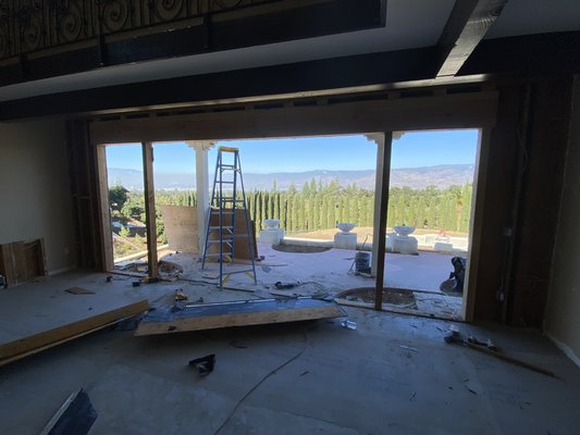 The Terrace Transformation - From closed-off to wide-open views! 🏔️✨ We tore down the back wall of this home to extend the living space and let the outside in. Swipe to see the process from demo day to the stunning finished exterior.
There’s nothing like a custom structural change to completely redefine a home. What do you think of this indoor-outdoor flow?