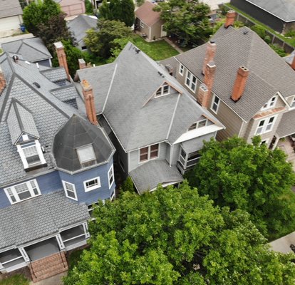 RoofRestor Shingle Rejuvenation - Victorian Village, Columbus, Ohio - Victorian Village Roof Restoration – Bringing New Life to an Aging Roof
This beautiful home in Columbus’s Victorian Village had an aging roof that was still in good shape but clearly needed a tune up and treatment. Take a close look at the transformation. The roof color went from a faded light gray to a rich dark gray. That darker shade is closer to how the shingles looked when they were first installed.
What’s happening here is not just a surface coating. RoofRestor rejuvenates your shingles by restoring the natural oils that make them flexible and able to retain their protective granules. Unlike sealants which can trap moisture and cause damage, RoofRestor allows your roof to breathe and perform as it was designed to.
This treatment includes a free tune up to address minor issues like nail pops and unsealed nails. Plus, it comes with a 5-year transferable warranty guaranteeing that the areas we tune up won’t leak and that your shingles will stay flexible and protected.
If your roof looks tired but is not ready for replacement, RoofRestor is a smart and cost-effective solution to extend its life and restore its original beauty. RoofRestor Shingle Rejuvenation - Victorian Village, Columbus, Ohio - Victorian Village Roof Restoration – Bringing New Life to an Aging Roof
This beautiful home in Columbus’s Victorian Village had an aging roof that was still in good shape but clearly needed a tune up and treatment. Take a close look at the transformation. The roof color went from a faded light gray to a rich dark gray. That darker shade is closer to how the shingles looked when they were first installed.
What’s happening here is not just a surface coating. RoofRestor rejuvenates your shingles by restoring the natural oils that make them flexible and able to retain their protective granules. Unlike sealants which can trap moisture and cause damage, RoofRestor allows your roof to breathe and perform as it was designed to.
This treatment includes a free tune up to address minor issues like nail pops and unsealed nails. Plus, it comes with a 5-year transferable warranty guaranteeing that the areas we tune up won’t leak and that your shingles will stay flexible and protected.
If your roof looks tired but is not ready for replacement, RoofRestor is a smart and cost-effective solution to extend its life and restore its original beauty.