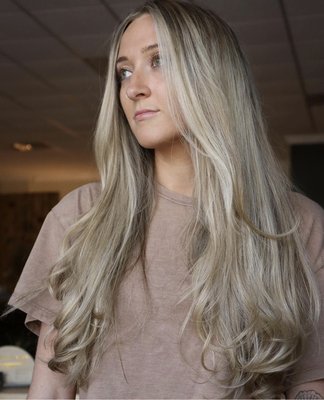 Balayage highlights - Full custom highlights designed to safely lift dark hair to a bright, dimensional blonde. This service included color correction to remove existing box color, followed by precision foiling and toning to achieve an even, luminous result. Focused on hair integrity, seamless blending, and long-lasting blonde results with a healthy finish.