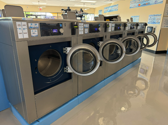 We Offer Commercial Services! - Commercial laundry is a necessary evil for many businesses. It can be time-consuming and expensive to have your company's clothes professionally laundered. The good news is that WaveMAX Laundry of Chandler is here to help you out.

WaveMAX Laundry has made it our mission to provide quality service at affordable prices. Our commercial washers use the latest technology that literally provides whiter whites, brighter colors, and softer laundry. Our friendly attendants are here to meet the needs of your business. Special requests? We've got you covered.

Plus, with our exclusive Omni UV sanitization system, WaveMAX provides your customers and employees a clean and disinfection they will not get at any other laundry. Get effective disinfection on all your commercial laundry needs that are 500 times more powerful than hot water and bleach.
Enjoy the peace of mind of knowing you are providing the SAFEST clothing and linen possible for your customers, EVERY TIME!

We will provide the soap and dryer sheets. We hang up your
dresses, collared shirts, and dress pants. How’s that for service!

When you need your business uniforms, clothing, bedding, linens, and more cleaned, call WaveMAX! Your employees will thank you for giving them more time outside of work instead of standing around waiting for their clothes to get washed and dried. And since we know that no one likes paying high prices, we offer competitive rates on all services provided with no hidden fees or markups! You won’t find a better value than WaveMAX Commercial Laundry Services in Chandler, AZ!