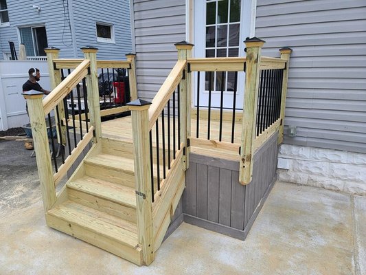 Roselle project - The customer wanted to create a usable space for her family to be able to enjoy there backyard. We poured a 10x20 concrete pad, added a back door and gave her a nice oversized set of steps coming out. They were a pleasure to work for and excited to start there next project.
