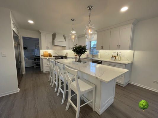 Clean and Airy - Cabinet Tree 🌳 Remodel: Before and After
😍 
Between the full-height backsplash and expansive island, this budget-friendly kitchen has us wishing for a white Christmas!
Budget expectation: $25,000-$29,999 (excludes flooring) 

Project Details:
• Forevermark Cabinets
• Wood Type: Solid Birch
• Door Style: Shaker
• Sherwin Williams Finish: Ice White
• Quartz Tops: Calacatta Laza by MSI

🌳 ”Your kitchen. Your bath. Your budget.” 🌳