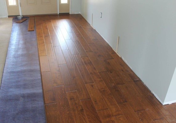 House flooring - Floor laying in the house, corridor and bedrooms House flooring - Floor laying in the house, corridor and bedrooms