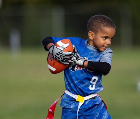 Flag Football - Flag football for kids offers a great way to learn the fundamentals of football—passing,  catching, running, and defense with less risk of contact as traditional football. It also promotes physical fitness, social development, and sportsmanship. Many parents, especially those with young girls, appreciate that flag football gives their kids more opportunity to try the sport they like to watch on tv!