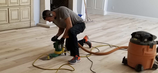 Hardwood Floor Installation - Arizona Hardwood Floor Supply offers expert hardwood floor installation in Gilbert, Phoenix, Peoria, and Scottsdale. From engineered to solid hardwood, our high-quality products, skilled installers, and unmatched customer service ensure stunning, long-lasting results. We provide tailored flooring solutions to suit every style, budget, and space, making us the trusted choice for both residential and commercial projects.
The global flooring market held a value of 359.20 billion USD in 2021 and is expected to rise to over 5 billion USD in 2028. So, it's no secret that hardwood flooring will certainly increase the value of your home. And let's not forget that the timeless addition of hardwood will beautifully transform your home and have the durability to last for ages.
Clearly, wood flooring isn’t a new trend. It is a floor design tested through time and loved by homeowners for generations. Hardwood is captivating, long-lasting, and a money saver in the long run.
The selections you have when working with hardwood aren't limited either. Staining, finishes, engineered wood, and unique species allow you to choose from nearly limitless possibilities. But how do you get started with hardwood floor installation and know which hardwood flooring is right for you?
Don't worry. We got you covered! We have outlined everything you need to know about hardwood flooring installation and how to get started with a contractor today! Hardwood Floor Installation - Arizona Hardwood Floor Supply offers expert hardwood floor installation in Gilbert, Phoenix, Peoria, and Scottsdale. From engineered to solid hardwood, our high-quality products, skilled installers, and unmatched customer service ensure stunning, long-lasting results. We provide tailored flooring solutions to suit every style, budget, and space, making us the trusted choice for both residential and commercial projects.
The global flooring market held a value of 359.20 billion USD in 2021 and is expected to rise to over 5 billion USD in 2028. So, it's no secret that hardwood flooring will certainly increase the value of your home. And let's not forget that the timeless addition of hardwood will beautifully transform your home and have the durability to last for ages.
Clearly, wood flooring isn’t a new trend. It is a floor design tested through time and loved by homeowners for generations. Hardwood is captivating, long-lasting, and a money saver in the long run.
The selections you have when working with hardwood aren't limited either. Staining, finishes, engineered wood, and unique species allow you to choose from nearly limitless possibilities. But how do you get started with hardwood floor installation and know which hardwood flooring is right for you?
Don't worry. We got you covered! We have outlined everything you need to know about hardwood flooring installation and how to get started with a contractor today!