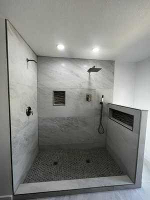 Bathroom Renovation - We love the final results on this project and so did our customers . That is what matters the most to us .