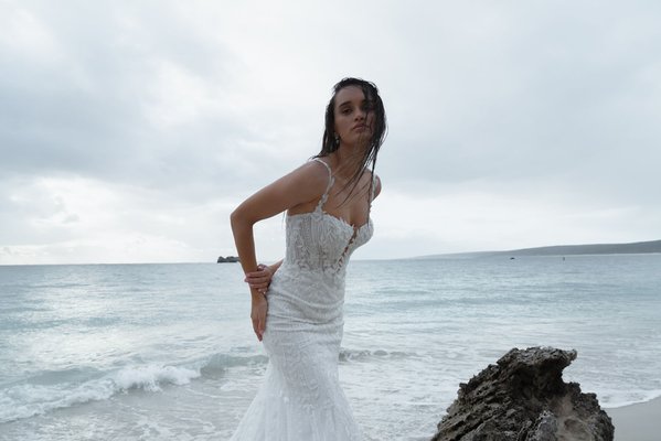 Designer: Jeune Bridal - ‘Jeune’ is an exploration of the contemporary bride, embedded in classic grandeur and punctuated with chic and couture inspired touches. She is the unexpected with curated maximalism and artfully sculpted silhouettes, with unapologetic decadence designed to enhance the beauty of modern brides.