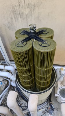 cleaning out some nasty filters - Call now to schedule a filter cleaning today!