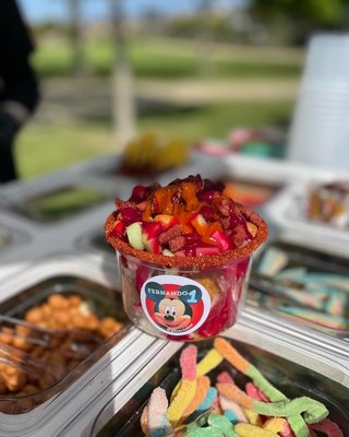 Snack N Bar - Tostiloco bar for your next event with sweet & spicy candy topping with a choice of 1 agua fresca. Snack N Bar - Tostiloco bar for your next event with sweet & spicy candy topping with a choice of 1 agua fresca.