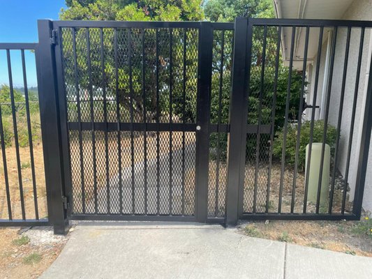 Outdoor Enclosures - We make railings, garage doors, fences, and anything you could imagine with metal! Outdoor Enclosures - We make railings, garage doors, fences, and anything you could imagine with metal!