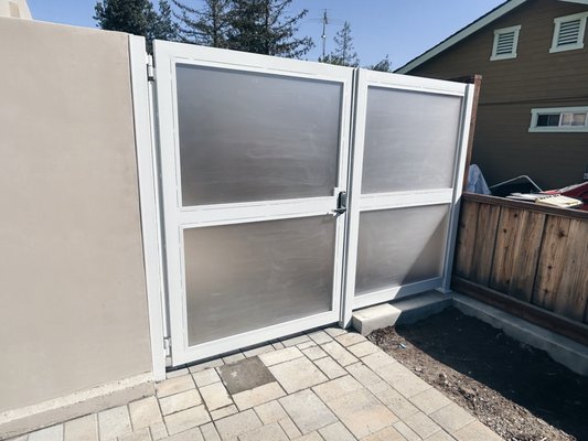 Modern Privacy Pedestrian Gate with Frosted Panels | Custom Design - Discover our modern privacy pedestrian gate with sleek frosted panels, offering both security and style. Custom-designed for durability and elegance, perfect for any contemporary property. Explore high-quality pedestrian gates on our website at resoluteiw.com Modern Privacy Pedestrian Gate with Frosted Panels | Custom Design - Discover our modern privacy pedestrian gate with sleek frosted panels, offering both security and style. Custom-designed for durability and elegance, perfect for any contemporary property. Explore high-quality pedestrian gates on our website at resoluteiw.com