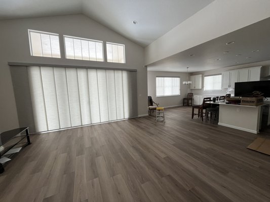 Castle Rock New Home - This customer wanted a sleek and modern solution to cover his windows and 20’ wide slider. We chose the Hunter Douglas Designer Roller Shades and the Hunter Douglas Skyline.