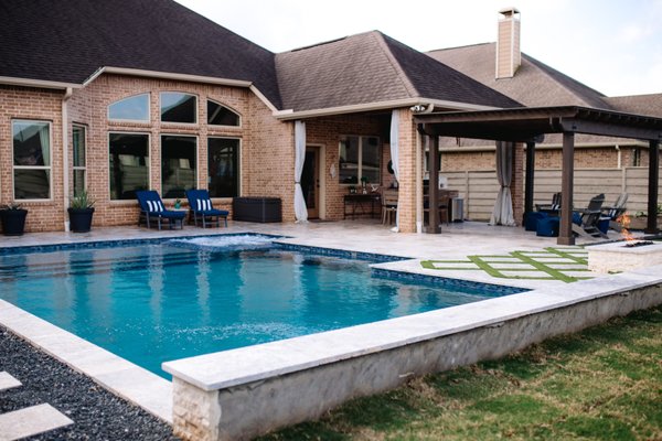 Linear Pool with Flush Spa - Avree Custom Pools has been creating backyard retreats for decades, transforming outdoor spaces into an oasis that can be enjoyed year-round. Designing and building projects that fit your lifestyle and unique preferences with excellence is our mission.