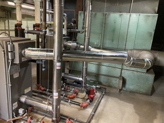Commercial Boiler Replacement - I.T.S. is currently working with EIS Wire in South Hadley MA to replace their commercial boilers. Prior to this I.T.S. had worked with EIS Wire to replace some of their A/C Units. When they began to have issues with their boilers they gave I.T.S. a call because we are experts in boiler replacements.
To start, our team of experienced plumbers demolished their current broken boiler. We then were able to install their new and improved boiler. We returned heat to their building and improved their working conditions!
Because our I.T.S. plumbers are top notch, EIS Wire hired us to continue work on their commercial boiler system. We are currently working on the demolition and replacement of their other boiler. Be sure to check back in to see the full finished project with EIS Wire! Commercial Boiler Replacement - I.T.S. is currently working with EIS Wire in South Hadley MA to replace their commercial boilers. Prior to this I.T.S. had worked with EIS Wire to replace some of their A/C Units. When they began to have issues with their boilers they gave I.T.S. a call because we are experts in boiler replacements.
To start, our team of experienced plumbers demolished their current broken boiler. We then were able to install their new and improved boiler. We returned heat to their building and improved their working conditions!
Because our I.T.S. plumbers are top notch, EIS Wire hired us to continue work on their commercial boiler system. We are currently working on the demolition and replacement of their other boiler. Be sure to check back in to see the full finished project with EIS Wire!