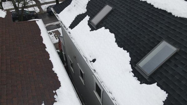 Emergency Snow Removal - Dan c call us and telling us that his down spot has fell down due to the overwhelming ice and snow that was into his gutters and onto his roof so we have sent a crew out there to look over into give him the best way to go about it and we have removed 6 inches of ice in the gutters because he has oversized gutters we removed and it was recommended to put kind regards for the best way of protecting his gutters. Job will complete. 12-10-25￼