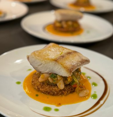 Seafood Entree - Dive into a sea of flavors with our seafood entree, showcasing the finest catches prepared with precision and creativity to transport you to coastal culinary bliss.