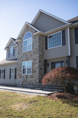 Portico, Driveway, & Walkway Project - Quite a few things carried out on this home over in Shoreham, NY. New driveway, front walkway, and portico.