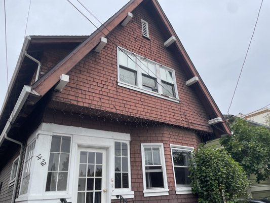 Fiber cement siding - This  historic home has old wood shingle siding.  The city require home owner to keep the shingle look. Wood shingle are highly flammable and hard to maintain.
Ron at Attico siding suggested the James Hardie fiber cement pre painted shingle siding. Problem solved, for the city and the home owner. The shingle fiber cement siding also comes pre painted, with 15 years warranty on the paint.  The fiber cement shingles comes with a 30 years  warranty.
Fiber Cement siding by James Hardie, are non combustible and resists  damage from extreme heath.