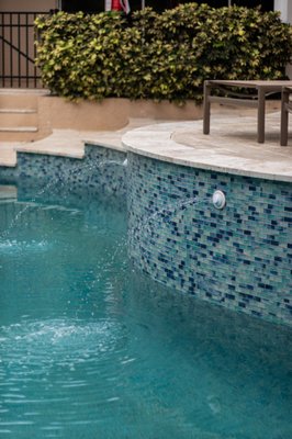 Pool Remodel in Tampa - This remodel was done on a pool that was impacted by flooding from the Oct 2024 storms.  We replaced the entire pool deck with travertine, installed new tile, a new pebbletec pool finish, and new coping.  We also installed a new pool pump and filter.