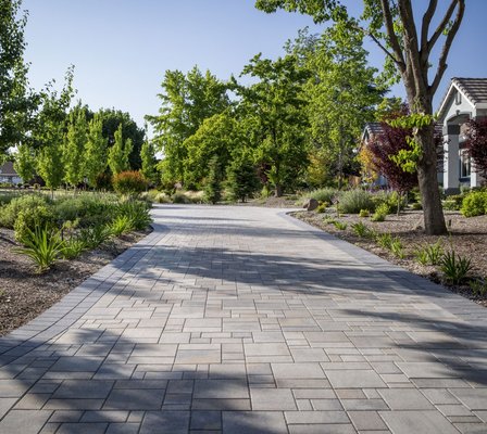 Driveway Transformation - Take a look at this beautiful Driveway transformation! These valued customers concrete driveway was failing them. Outdated and showing some severe cracking, we were able to work with them to transform their driveway into something that highlighted their beautify landscaping and lovely home. This driveway will last them decades to come and continue to highlight their amazing property! Driveway Transformation - Take a look at this beautiful Driveway transformation! These valued customers concrete driveway was failing them. Outdated and showing some severe cracking, we were able to work with them to transform their driveway into something that highlighted their beautify landscaping and lovely home. This driveway will last them decades to come and continue to highlight their amazing property!