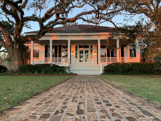Historic Bacon-Jones Home Landscape Renovation - A 150 year old home on Mobile Bay underwent a massive restoration in 2020 - and JubileeScape was engaged to re-design the expansive two acre property from entrance to bayfront. Our goal was to carefully preserve the heritage Live Oaks and Japanese Maples, while installing mature shrubs and trees to ensure privacy and symmetry with discerning neighbors. The historic brick walkways and patio were preserved with surrounding beds of split leaf philodendrum, agapantha, viburnam and limelight hydrangeas. Plum ewes, mature holly trees and viburnam were installed to provide attractive borders for the spectacular white picket fence surrounding the entire property. More than an acre of zoysia sod was installed as well as a vegetable and flower garden and full grown satsuma trees. This showcase property does its history proud... and will be complete by early Spring 2021. Historic Bacon-Jones Home Landscape Renovation - A 150 year old home on Mobile Bay underwent a massive restoration in 2020 - and JubileeScape was engaged to re-design the expansive two acre property from entrance to bayfront. Our goal was to carefully preserve the heritage Live Oaks and Japanese Maples, while installing mature shrubs and trees to ensure privacy and symmetry with discerning neighbors. The historic brick walkways and patio were preserved with surrounding beds of split leaf philodendrum, agapantha, viburnam and limelight hydrangeas. Plum ewes, mature holly trees and viburnam were installed to provide attractive borders for the spectacular white picket fence surrounding the entire property. More than an acre of zoysia sod was installed as well as a vegetable and flower garden and full grown satsuma trees. This showcase property does its history proud... and will be complete by early Spring 2021.