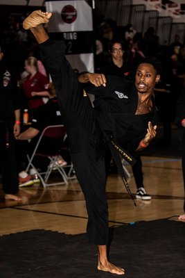 TAE KWON DO - "As a Tae Kwon Do instructor with extensive competitive and practical experience, I teach a blend of traditional and combat-focused techniques. Adults sharpen skills and confidence, while kids learn respect and perseverance, all grounded in real-world applicability."