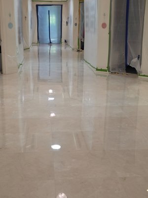 Carpet replacement to Marble 24x24 tiles. - Carpet replaced with Marble tiles in hallway way. Carpet replacement to Marble 24x24 tiles. - Carpet replaced with Marble tiles in hallway way.