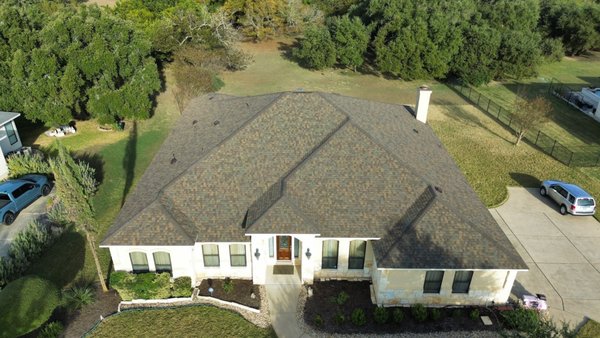 Beautiful Roof Upgrade in Driftwood, TX! Color: Teak - Check out this beautiful new Teak roof in Driftwood! -
State Farm referred this client to us when their roof was totaled from hail in 2024 and we upgraded their roofing system to the Lifetime Duration series from Owens Corning, complete with RizerRidge and a 35W solar attic vent from Attic Breeze! -
The combination of brown & gray tones perfectly complement this house's limestone exterior! 😍
Call McCannical Roofing & Exteriors out today and let us make your roof the sharpest on the block!
(512) 238-3000 Beautiful Roof Upgrade in Driftwood, TX! Color: Teak - Check out this beautiful new Teak roof in Driftwood! -
State Farm referred this client to us when their roof was totaled from hail in 2024 and we upgraded their roofing system to the Lifetime Duration series from Owens Corning, complete with RizerRidge and a 35W solar attic vent from Attic Breeze! -
The combination of brown & gray tones perfectly complement this house's limestone exterior! 😍
Call McCannical Roofing & Exteriors out today and let us make your roof the sharpest on the block!
(512) 238-3000