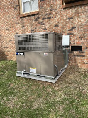 2.5 ton Heat pump package unit - Replaced old 1997 inefficient system with a new 14 seer York heat pump package unit with new concrete pad