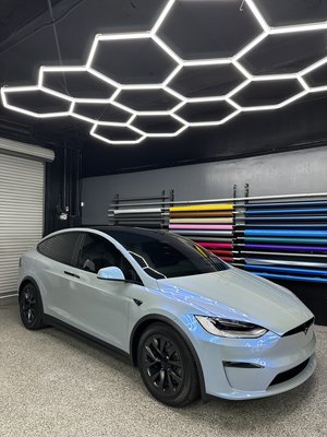 MOONSHINE GREY TO PURPLE VEHICLE WRAP - Changing this Tesla Model X vehicles paint from Black to Moonshine grey to purple iridescent vehicle wrap