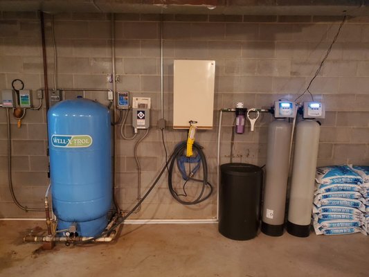 Filtration Installations - This portfolio contains photos of filtration equipment installations we have done over the years. Backwashing filtration equipment is used to address certain minerals in your water, such as pH, iron levels, and hardness. Got stinky water staining your fixtures? Or hard water ruining your hair and leaving build up on your fixtures? Call us today for a FREE mineral test! Filtration Installations - This portfolio contains photos of filtration equipment installations we have done over the years. Backwashing filtration equipment is used to address certain minerals in your water, such as pH, iron levels, and hardness. Got stinky water staining your fixtures? Or hard water ruining your hair and leaving build up on your fixtures? Call us today for a FREE mineral test!