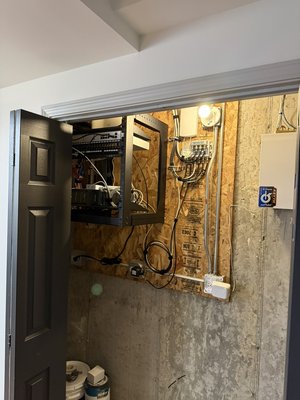 Home Network Refresh - This project involved a full home network cleanup and reorganization. Existing cabling was properly routed, secured, and labeled, and all networking equipment was consolidated into a wall-mounted rack for improved organization, airflow, and accessibility. Power and low-voltage components were cleaned up and repositioned to create a neat, serviceable layout. The end result is a clean, reliable, and professionally managed home network built for long-term performance and easy maintenance. Home Network Refresh - This project involved a full home network cleanup and reorganization. Existing cabling was properly routed, secured, and labeled, and all networking equipment was consolidated into a wall-mounted rack for improved organization, airflow, and accessibility. Power and low-voltage components were cleaned up and repositioned to create a neat, serviceable layout. The end result is a clean, reliable, and professionally managed home network built for long-term performance and easy maintenance.