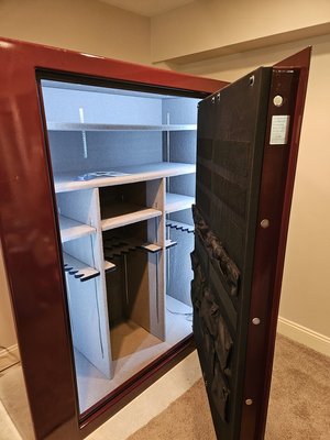 Safe moving & installation - This large gun safe (~1500lbs) took 3 people with specialized equipment about 4 hours and lots of effort to complete the installation. Some minor demolition work was completed by the home owner prior to installation in order to clear a path inside the home. Specialized equipment was used to safely move it into place without causing any further damage. This model features and internal outlet for power and has automatic lights which activate as the door is opened. We connected the power as an additional step during this installation. All pallets, shipping materials and trash were removed. The work area was swept clean before our staff left. Safe moving & installation - This large gun safe (~1500lbs) took 3 people with specialized equipment about 4 hours and lots of effort to complete the installation. Some minor demolition work was completed by the home owner prior to installation in order to clear a path inside the home. Specialized equipment was used to safely move it into place without causing any further damage. This model features and internal outlet for power and has automatic lights which activate as the door is opened. We connected the power as an additional step during this installation. All pallets, shipping materials and trash were removed. The work area was swept clean before our staff left.