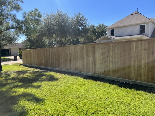 Cypresss tx -- complete fence replacement - Leaning and old fence was remplaced for this new fence all cedar pickets, root board and cedar cap and trim on back side Cypresss tx -- complete fence replacement - Leaning and old fence was remplaced for this new fence all cedar pickets, root board and cedar cap and trim on back side