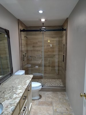 The Grand Canyon shower door the Double sliding barn door style shower door - Grand Canyon
Behold the wonder of the Grand Canyon Frameless Sliding Shower Door. Offering all the leading-edge appeal of a frameless enclosure with the familiarity of a traditional bypass unit. The Grand Canyon features dual sliding panels, allowing entry and exit from either side of the shower. This ultramodern roller system operates above the header support bar that spans the top of the opening. A truly spectacular upgrade to any state-of-the-art bathroom renovation. The Grand Canyon shower door the Double sliding barn door style shower door - Grand Canyon
Behold the wonder of the Grand Canyon Frameless Sliding Shower Door. Offering all the leading-edge appeal of a frameless enclosure with the familiarity of a traditional bypass unit. The Grand Canyon features dual sliding panels, allowing entry and exit from either side of the shower. This ultramodern roller system operates above the header support bar that spans the top of the opening. A truly spectacular upgrade to any state-of-the-art bathroom renovation.