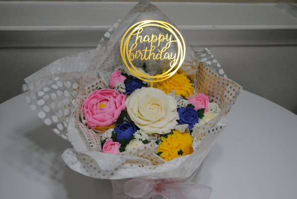 Cupcake Bouquet - Get the best of both words - flowers and cake! Perfect for a small birthday celebration.
