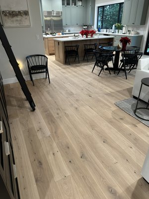 Engineered wide planks glue and nail down - This was a fun project and it came out great I’m especially happy with the trapdoor.