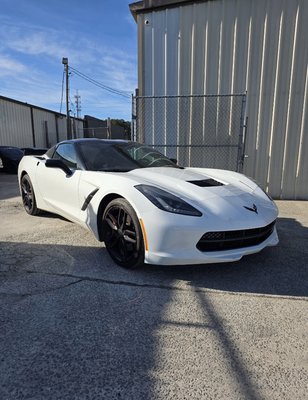 White C7 Stingray headlight service. Correct bulb specs, no warning lights, beam pattern aligned. We verify, not guess. - C7 Corvette Stingray headlight bulb replacement. OEM-spec installation with proper alignment and module verification. Performance vehicles require precision work—not guesswork. Serving Corvette, Camaro, and performance car owners. 4598 Buford Hwy Ste A, Norcross. (470) 714-3709